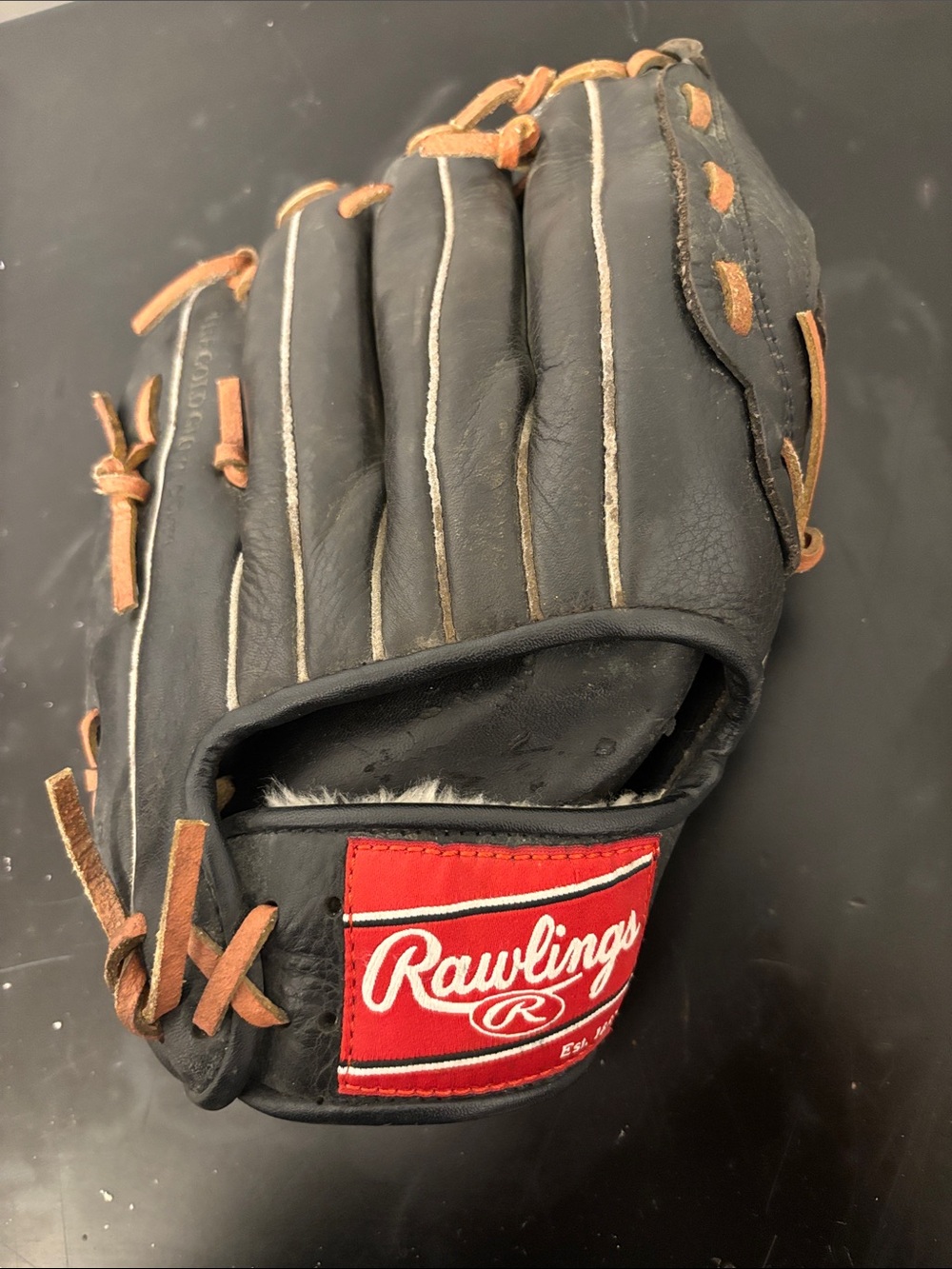 Rawlings Black Leather Baseball Glove with Tan Lacing and Red Logo